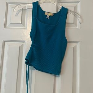 Asymmetrical turquoise l top